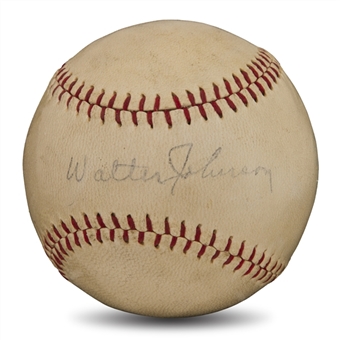 Walter Johnson Single-Signed  Baseball with Nr Mint 7 Signature (PSA/DNA 6.5 Overall)